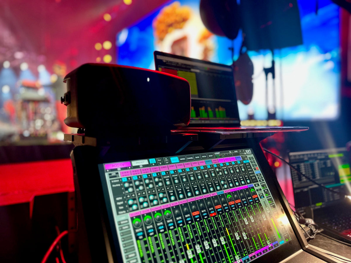 IK multimedia iLoud and macBook sitting on top of two StageStrike LV1-compatible digiTops