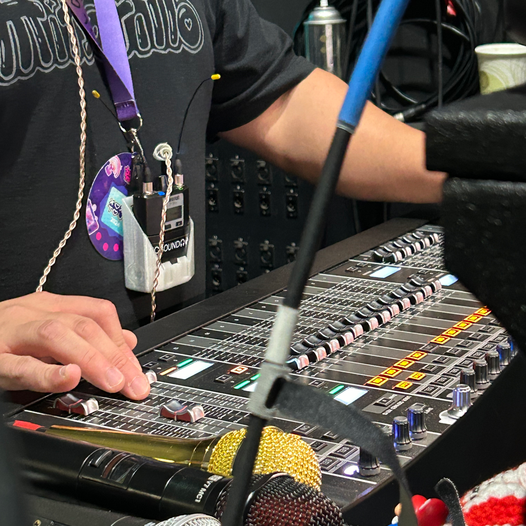 packHanger in use at a live show — wireless bodypack organization
