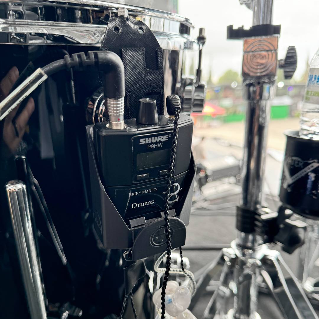 packHanger in use by audio engineer Tony Scapa — wireless bodypack organization on a mic stand