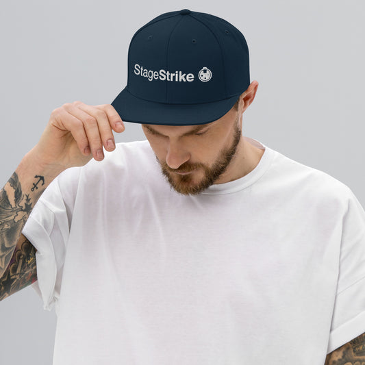 StageStrike Hat — dark navy snapback, front view